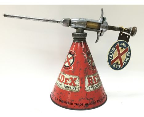 A vintage Redex oil squirter and redex car badge , 23cm tall. Postage category C