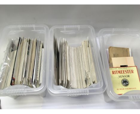 An extensive collection of great Britain first day covers, many with special hand stamps, housed in plastic containers.