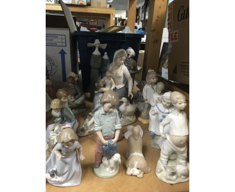 A collection of Nao figures various including large mother and child, Golden Memories figure etc