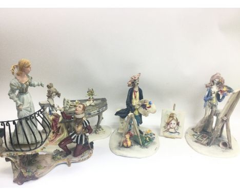 A collection of Italian porcelain figures including a Capodimonte Romeo and Juliet figure group and E Tezza figures. This lot