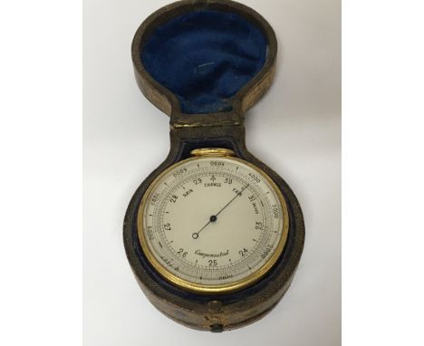 A Quality Victorian gilt metal pocket barometer and compass with makers stamp Singers patent. In a leather double sided case.