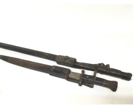Two First World War Military bayonets both blades with marks.