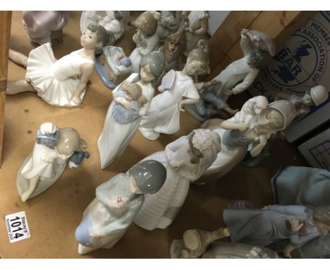 A collection of Nao figures including Pillow Fight, girl with doll and boy with puppy