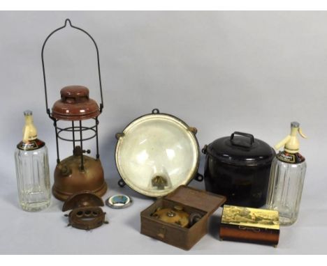 A Vintage Hurricane Lamp in need of Attention, Two Schweppes Soda Syphons, Outside Circular Light, Cooking Pot Etc