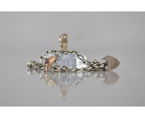 A Silver Charm Bracelet and Two Silver Charms, Curb Link Chain Marked for London 1972, Silver Padlock Clasp, Grandfather Cloc