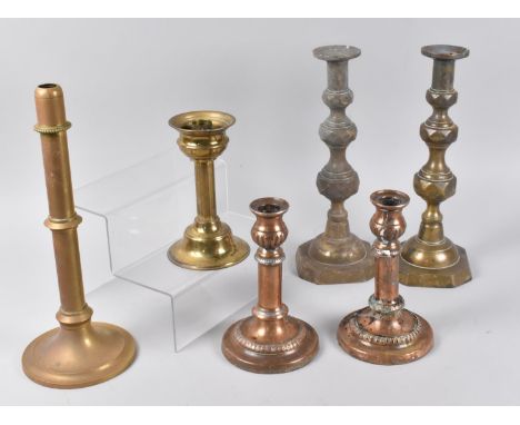 A Tall Pair of Brass Candlesticks, 30cms High, a Pair of Rubbed Sheffield Plate Candlesticks, 18cms High, a Brass Students Re