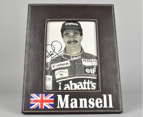 An Autographed Photograph of Nigel Mansell n Leather Easel Frame having Decals Removed from His Car