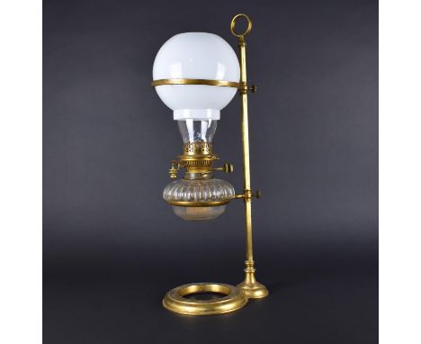 A Late Victorian Rise and Fall Oil Lamp with Glass Reservoir and Chimney and Opaque Glass Globe Shade, Ring Carrying Handle, 