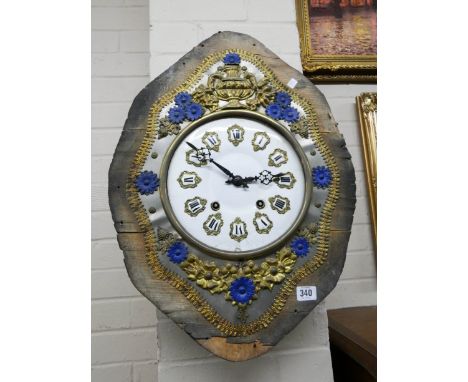 A floral decorated French wall clock with white enamel dial and striking movement  