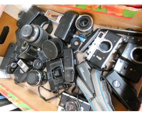 A box of camera accessories, lenses etc, all as found 