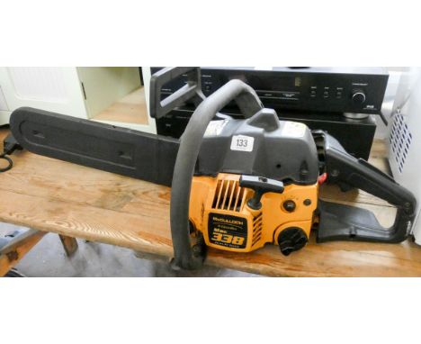 A McCullough petrol engine chainsaw 