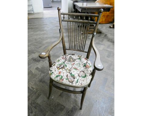 A Come back elbow chair with tapestry seat