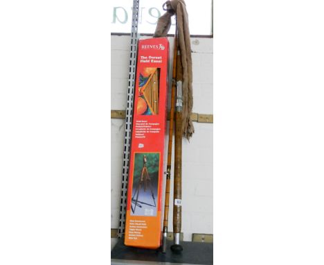 A boxed 'The Dorset Field Easel' and an old heavy split cane fishing rod 