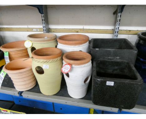 Two small grey garden planters, four strawberry planters and two ceramic planters