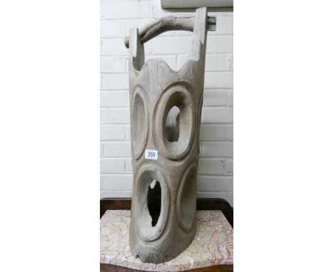 A bucket shaped carved wood stick stand 