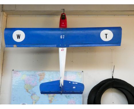 A large model plane with fibreglass body, 74" wing span, 55" long 