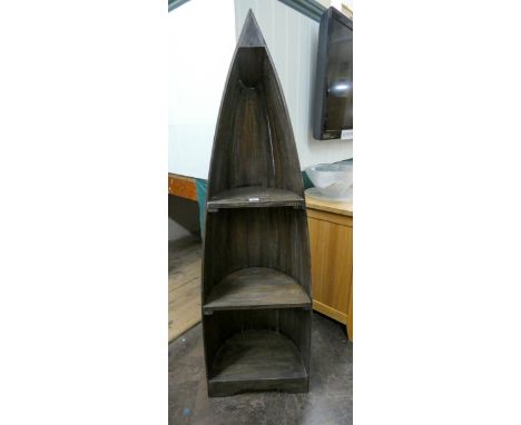 A boat shaped reclaimed timber bookcase or display shelf with painted decoration 