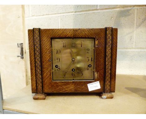 MANTEL CLOCK. Westminster chime oak cased mantel clock with brass face