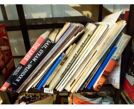 SHIPPING BOOKS. Shelf of shipping books and magazines 