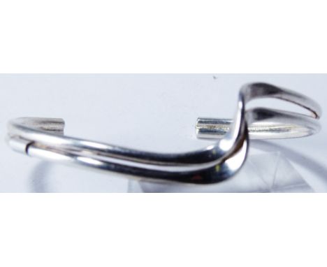 STERLING SILVER BANGLE. Sterling silver solid wave bangle