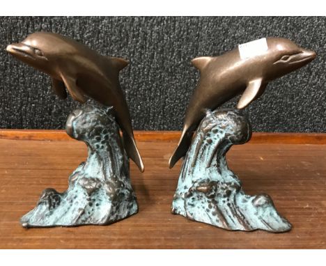 A pair of bronze dolphin bookends 
