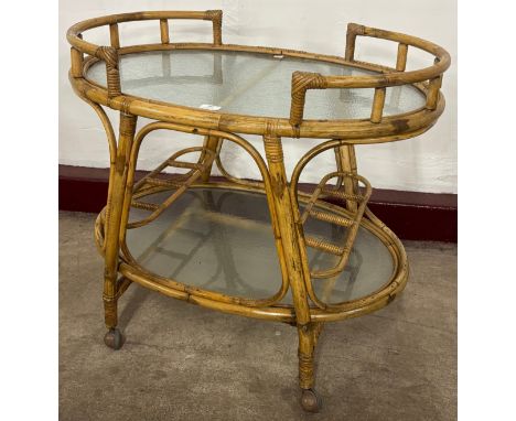 An Italian bamboo and glass cocktail trolley 