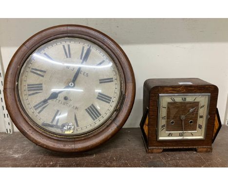 A Victorian circular mahogany wall clock, the dial signed W.J. Lees, Nottingham and an Art Deco oak mantel clock