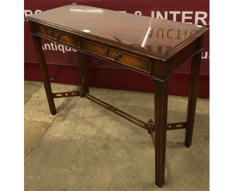 A Regency style mahogany two drawer console table 