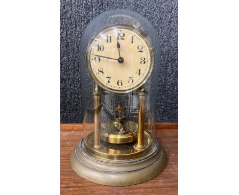 An early 20th Century brass and glass anniversary clock 