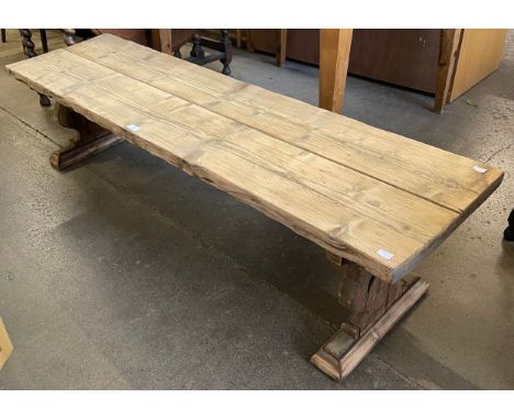 A rustic pine bench 