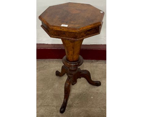 An early Victorian walnut trumpet shaped lady's sewing table 