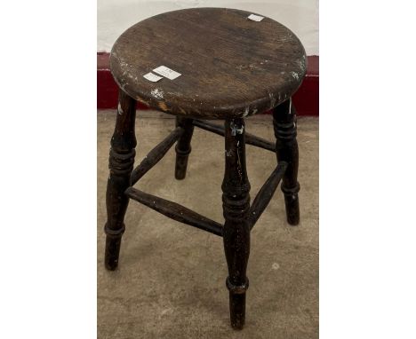 A Victorian oak kitchen stool 
