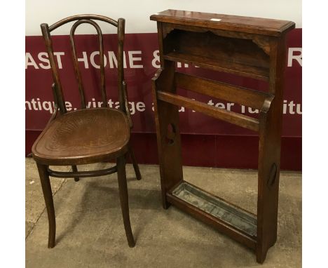 An Arts &amp; Crafts oak stick stand and an early 20th Century beech bentwood chair 