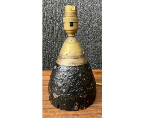 A trench art lamp base 