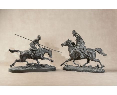 After Evgeny Aleksandrovich Lansere, (Russian 1848 - 1886), a matched pair of equestrian bronzes, Charging Lancer and Chargin