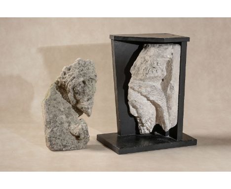A sculpted limestone architectural fragment with the profile visage of a bearded man, 14th / 15th century, portrayed with alm