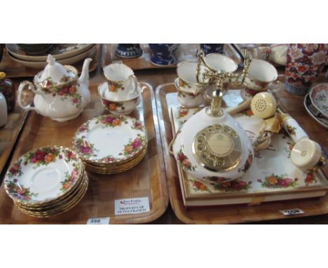 Two trays of Royal Albert bone china 'Old Country Roses' teaware and other items to include: teacups; saucers; side plates; m