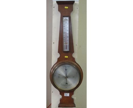 Modern mahogany wheel barometer.