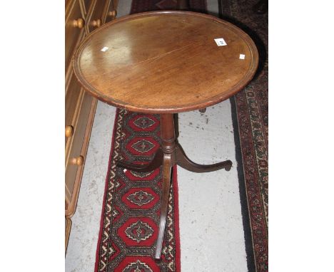 Regency style mahogany circular tripod wine table.