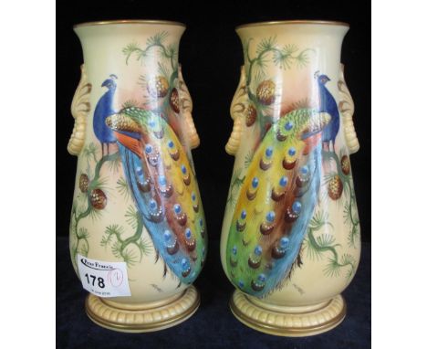 Pair of Locke and Co. Worcester vases, hand painted with peacocks, signed H. Wall, printed marks to bases. (2)