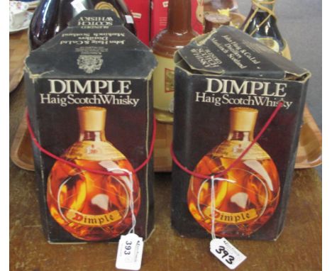 Two boxed dimple Haig scotch whisky bottles with original gold wire. (2)