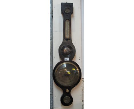 19th Century stained wheel barometer.