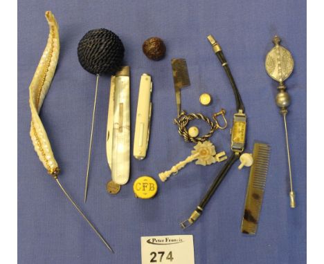 Group of assorted collectables to include: hat pins; mother-of-pearl and silver fruit knife; pocket knife; enamel button mark