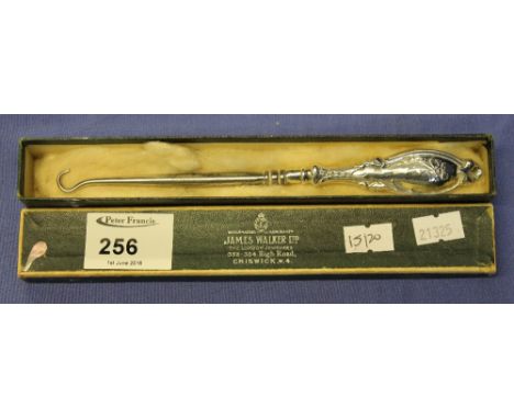 Silver handled button hook in James Walker Ltd. box.