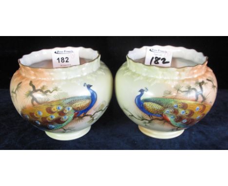 Pair of Locke and Co. Worcester baluster pot pourri jars, hand painted with peacocks, printed marks to base, no. 1046. (2)