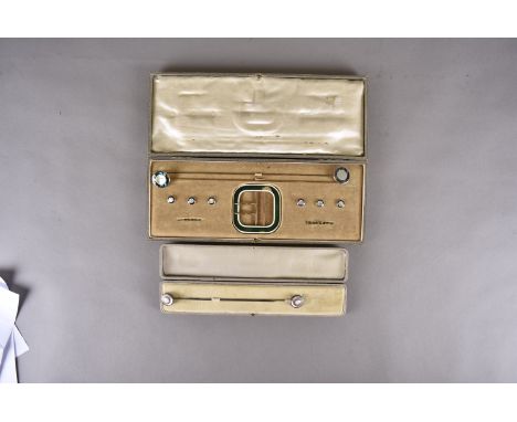 A 20th Century button and brooch set, the pins and buttons of white and green mother of pearl, the buckle of green engine tur