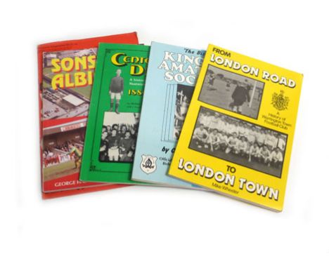 A shelf of Non-League football official match day programmes and paper ephemera of English teams and leagues dating from the 
