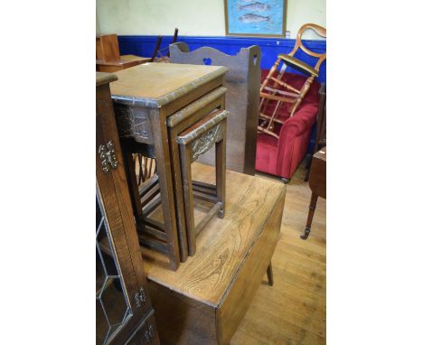 An Ercol drop leaf table, 138 cm wide, a nest of three Chinese occasional tables, the largest 44 cm wide, an oak kitchen dres