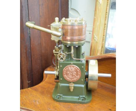 A painted and brass scale model, of a vertical engine, with a QEIIR Silver Jubilee 1977 plaque, 29.5 cm highheight to cylinde