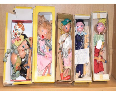 A Pelham puppet, Sailor, in original box, and other assorted puppets (qty)Strings tangled 
